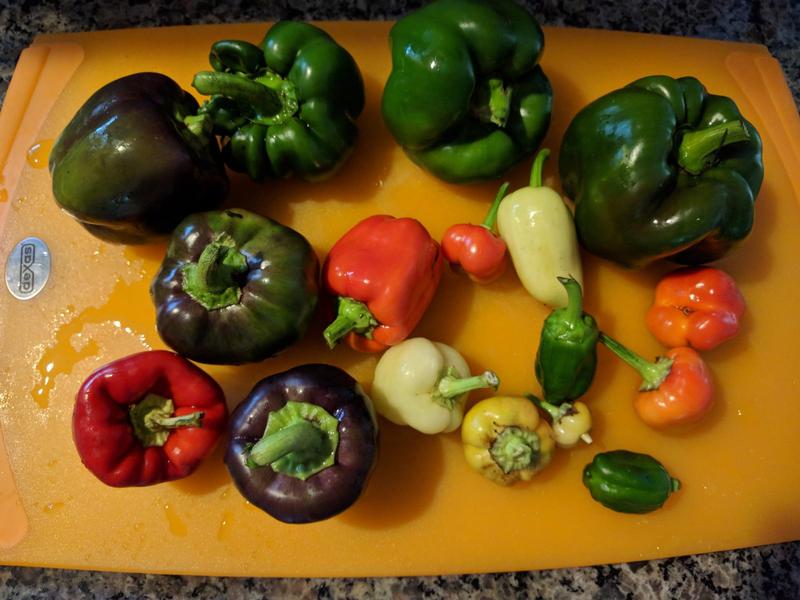 colorful peppers on a cutting board